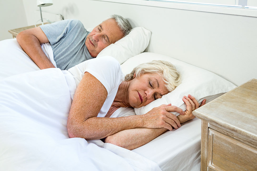 Mature Women Sleeps Next To Her Husband
